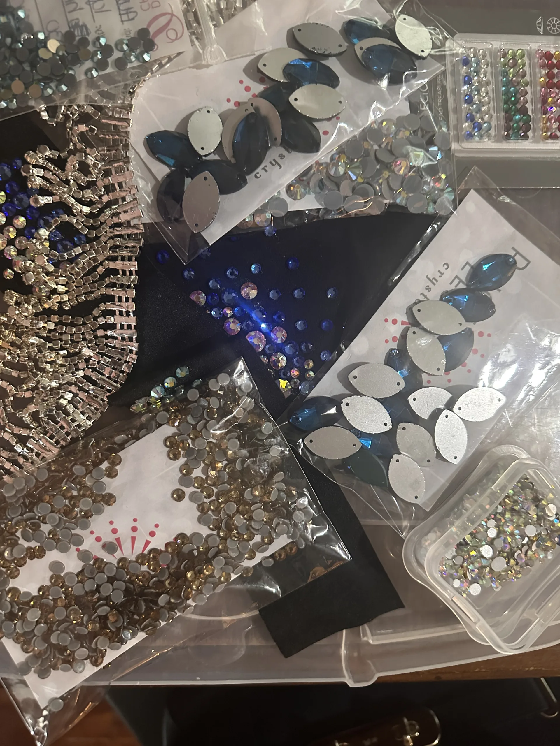 Adding sparkle to dancewear and cheer uniforms variations of embellishments