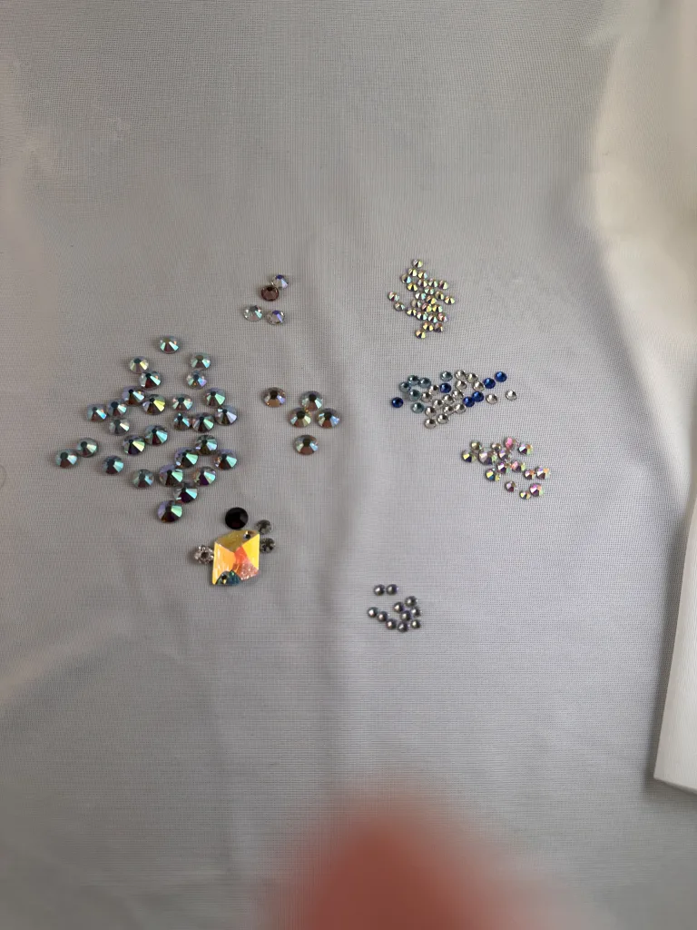 Our Rhinestone options services are flexible to fit a variety of budgets. Prices are based on stone quality quantity and design